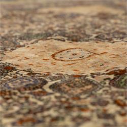 Persian Nain hand-knotted rug, central circular medallion with radiating floral scrolls and palmettes enclosed by ivory field with boteh and foliate motifs, framed by a series of guard stripes and a main border with scrolling arabesques in a midnight blue ground 