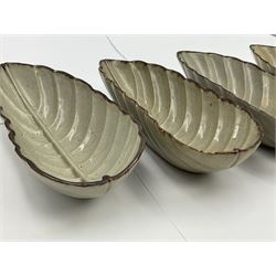 Set of four Japanese Meiji Celadon glazed leaf shaped dishes, impressed potters seal for Eiraku Zengoro XII (Wazen) (Japanese, 1823–1896), L19cm W8cm
