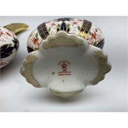 Pair of mid 20th century Royal Crown Derby Imari 1128 pattern Kedleston ewers, each with gilt scroll handle and neck, upon a gilt quatrefoil foot, each with printed marks beneath, H25.5cm