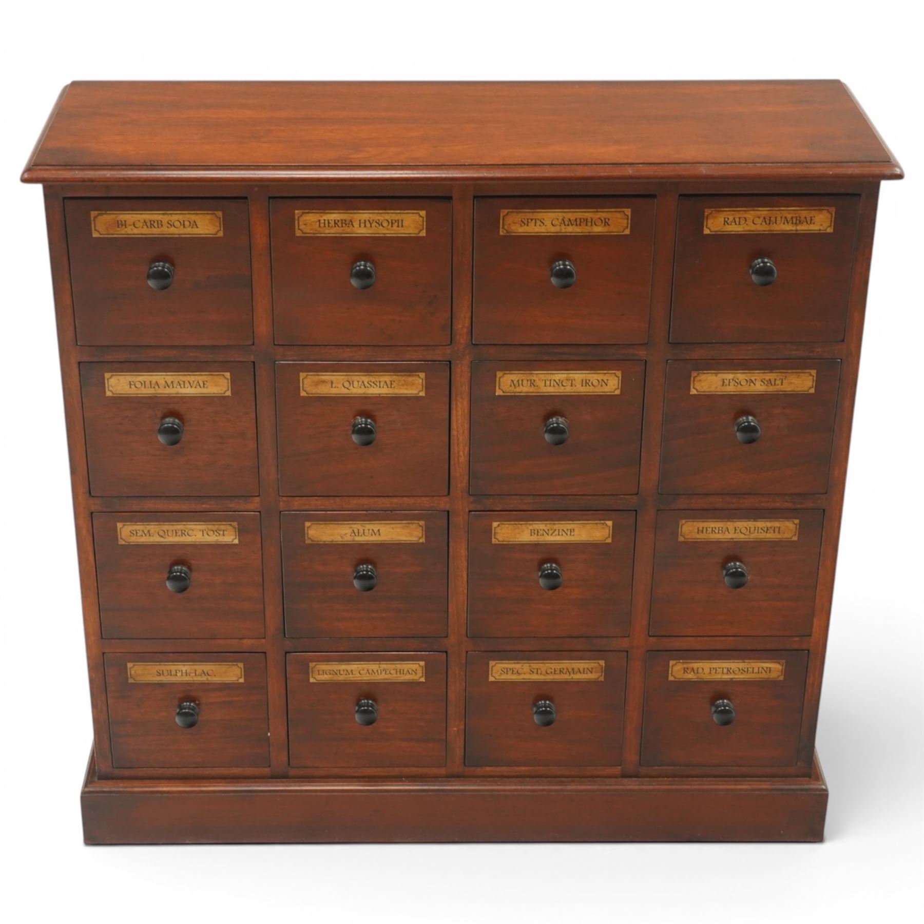 Victorian style mahogany stained chemist’s cabinet, rectangular moulded top over sixteen small drawers, each fitted with turned knob handle and applied gilt paper pharmaceutical labels, on moulded plinth base