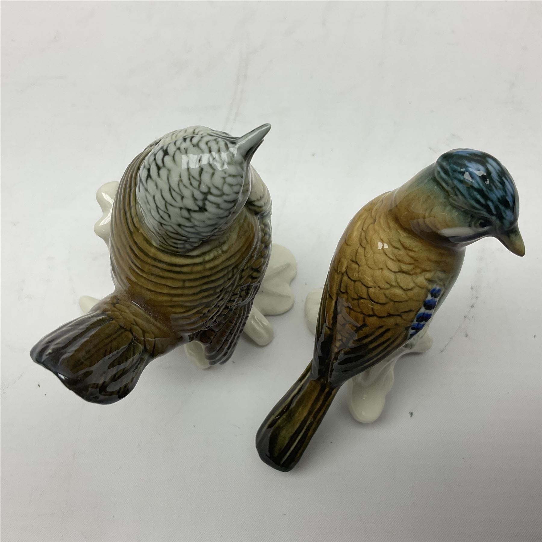 Eight Karl Ens bird figures, together with Mack blue tit and one other