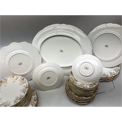 Royal Staffordshire part tea and dinner service, in a glit and floral pattern, to include five dinner plates, six side plates, twelve dessert plates, five teacups and saucers, two covered tureens, meat platter etc
