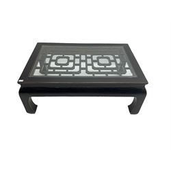 Chinese ebonised rectangular coffee table, inset glass top over pierced geometric fretwork, raised on shaped supports