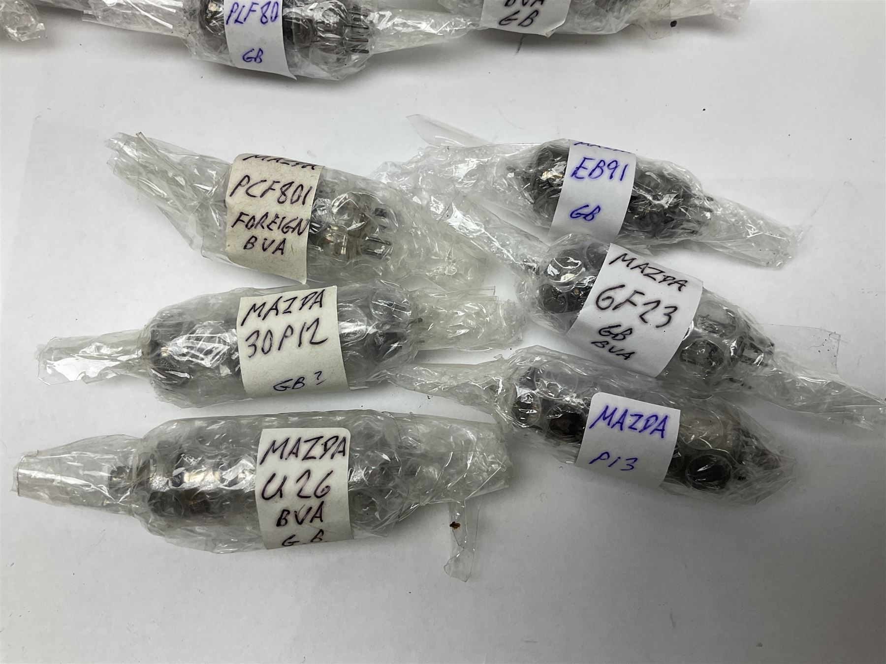 Collection of Mazda thermionic radio valves/vacuum tubes, including EH90, U26, PCF84, U26 approximately 55