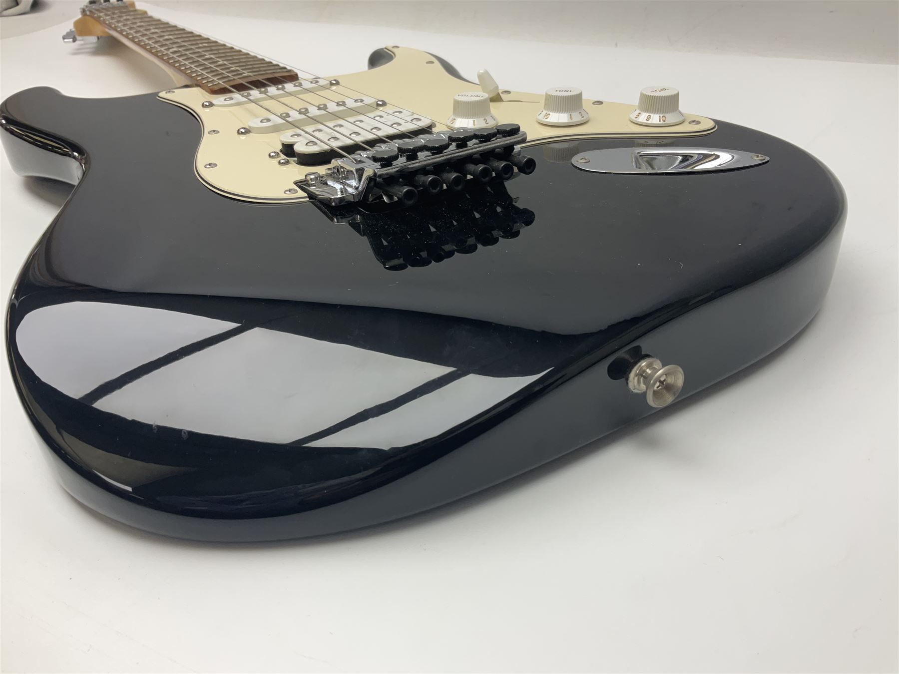 Mexican Fender Stratocaster electric guitar in black c2003 with Floyd Rose tremolo system, serial no.MZ3129600; L98cm; in Freestyle fitted case with 2006 Diamond Anniversary booklet