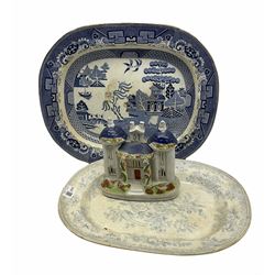 Staffordshire pottery castle with floral decoration H19cm, together with two victorian platters one in willow design and the other asiatic pheasant design. 