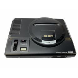 1990s Sega Megadrive 16bit games console with five games comprising Sonic the Hedgehog, Fifa International Soccer, Mickey Mouse Castle of Illusion, MicroMachines 2 Turbo Tournament and 1994 Lillehammer Winter Olympics, boxed with instructions