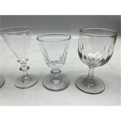Quantity of Georgian and Victorian glasses, comprising late 19th century Beehive decanter, two thumb print rummer glasses, two 1780s Bristol glass of wrythen form, early Victorian toastmasters glass, two late Georgian wine glasses, late 18th century petal moulded wine glass, and early 19th century facet cut small wine glass