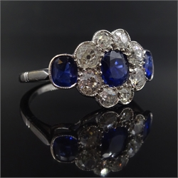  18ct white gold sapphire and diamond rim set cluster ring   