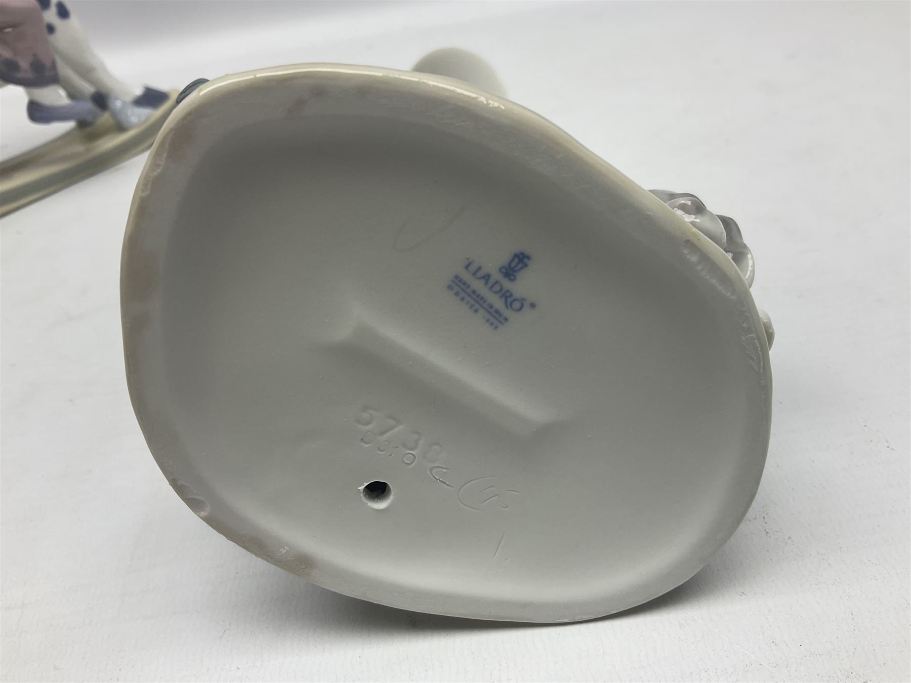 Three Lladro figures, Faithful Steed no 5769, Best Foot Forward no 5738 and Lambkins no 5469, all with original boxes, largest example H21cm 