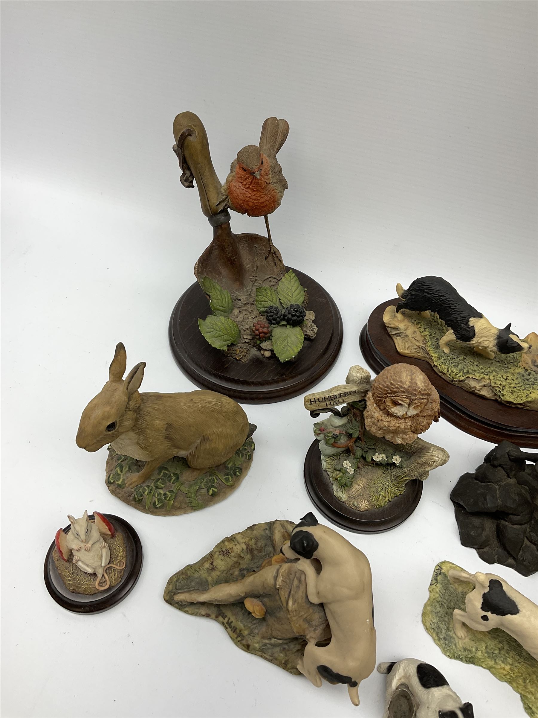 A Border Fine Arts figure, Scottish Black Faced Sheep with Collie, by Ray Ayres, on base, L30cm, together with three further Border Fine Arts figures, two examples modelled as Jack Russel Terriers, the third example modelled as a rabbit, plus a selection of other figures, including five by Country Artists, a bronze effect Heredities figure of a Jack Russel Terrier, etc.
