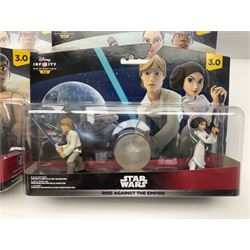 Star Wars - Disney Infinity - six Play Sets for The Force Awakens (five identical) and Rise Against The Empire; and twelve carded figures; all in unopened blister packs; and two other items (19)