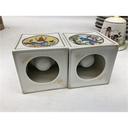 Royal Worcester Flower Fairies oval collectors plates, Goebel mustard pot, two Danbury Mint Fairy Tale bells, and pair of Hutschenreuther candlesticks decorated with scenes of Puss in Boots