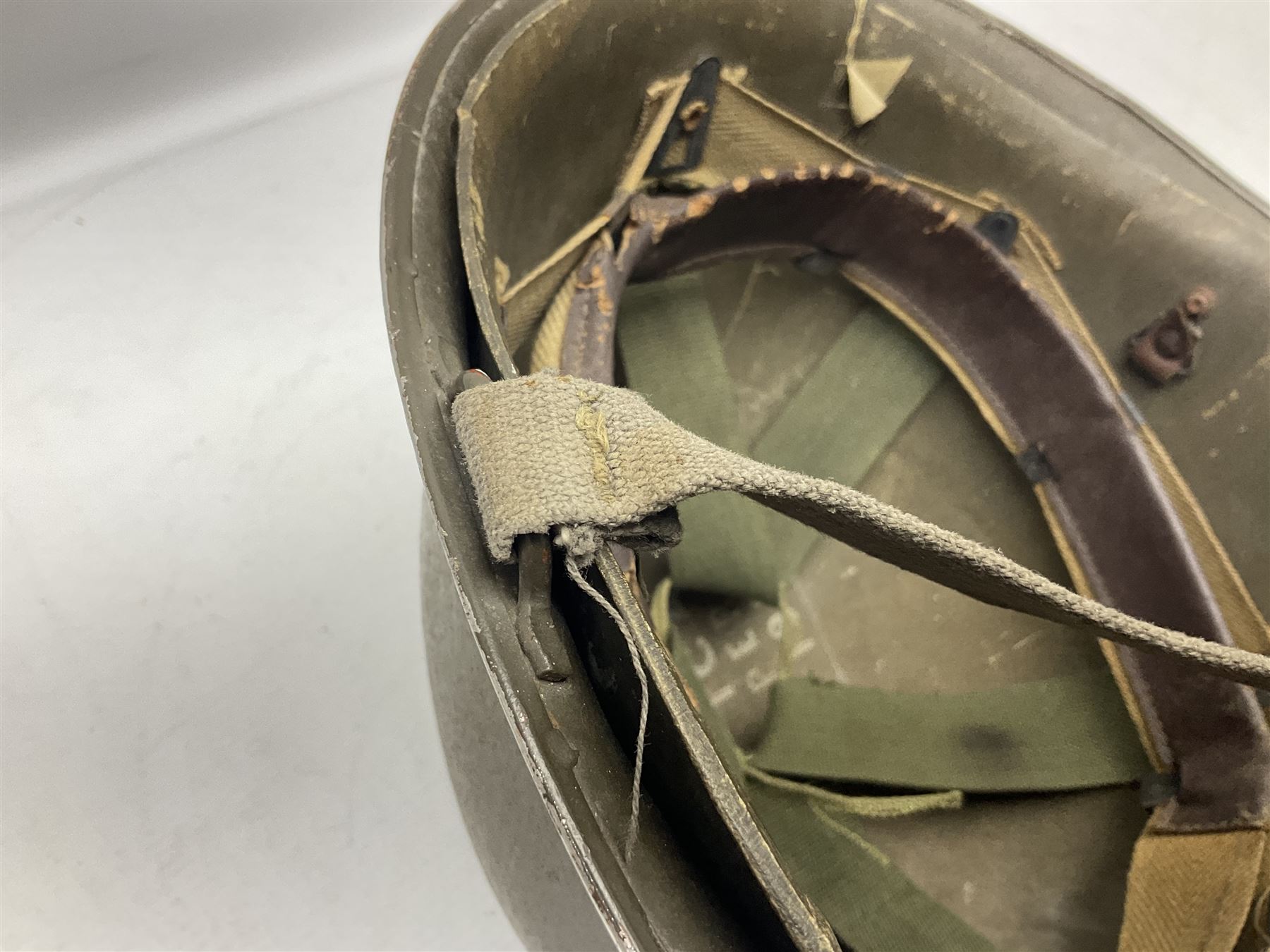 French Algerian War Red Cross steel helmet, marked 'CP ICA Esperaza 1955'; green finish with crudely painted Red Cross logo to the front