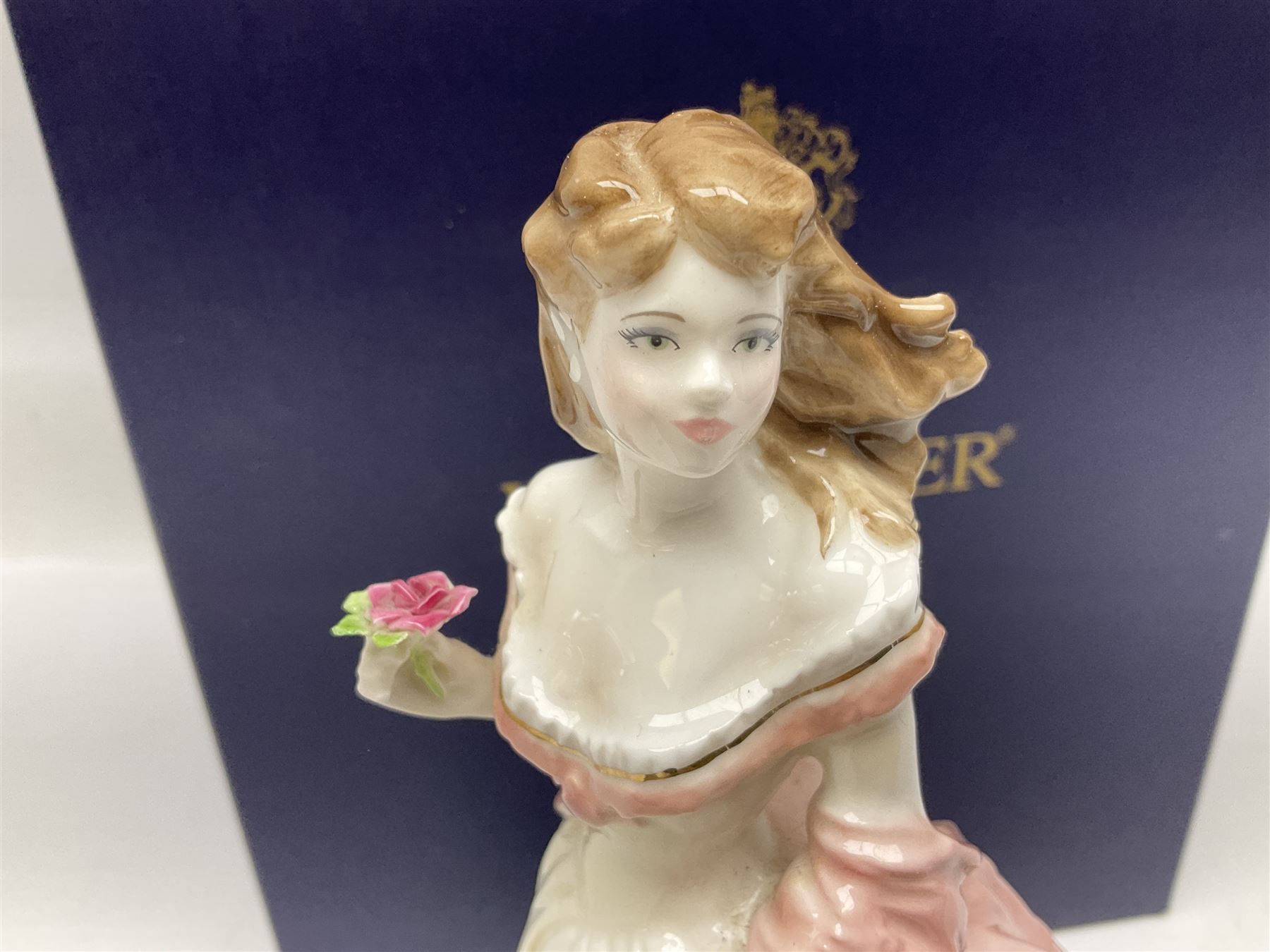 Three Royal Worcester figures, comprising Glyndebourne, with original box, Royal Worcester Special Even 1998 Elizabeth, with certificate and original box, and In Celebration of the Queens 80th Birthday 2006 