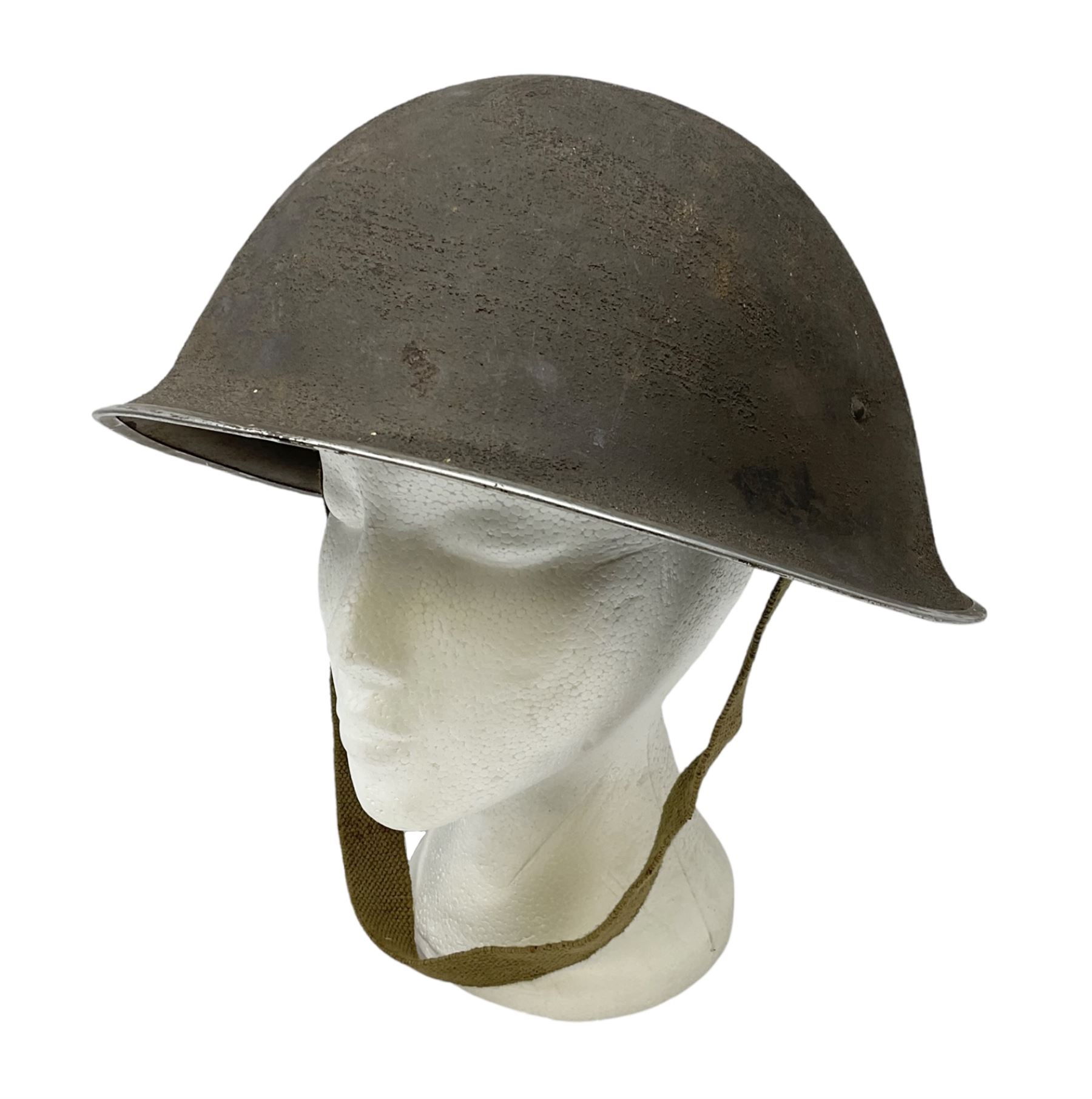 WW2 British Mk III steel combat helmet with textured finish and original liner