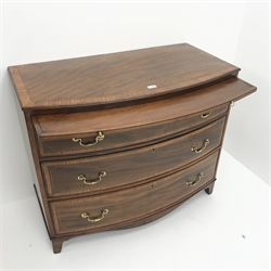  George III mahogany bow front bachelors chest, single slide above three graduating drawers, satinwood cross banding, ebony and box wood stringing, brass swan neck handles, shaped apron, tapering bracket supports, W103cm, H48cm, D55cm  