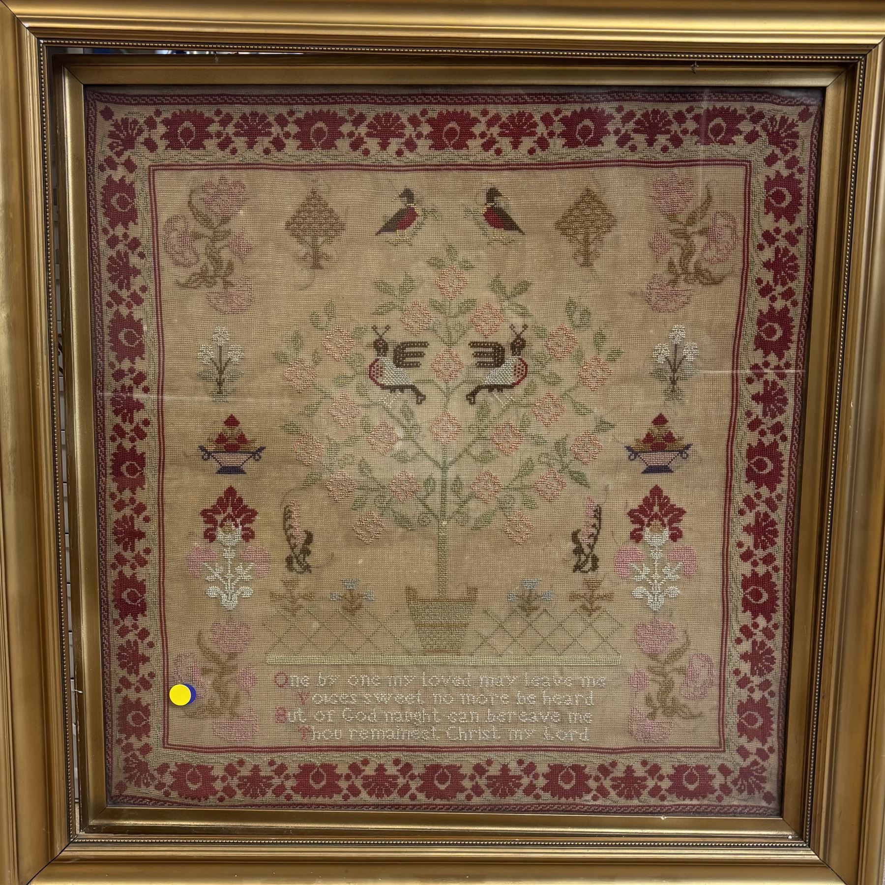 19th century sampler, worked with verse 'one by one my loved may leave me, voices sweet no more to be heard .....' beneath a flowering tree with birds perched amongst the branches, within a foliate boarder, in a gilt frame, H80cm