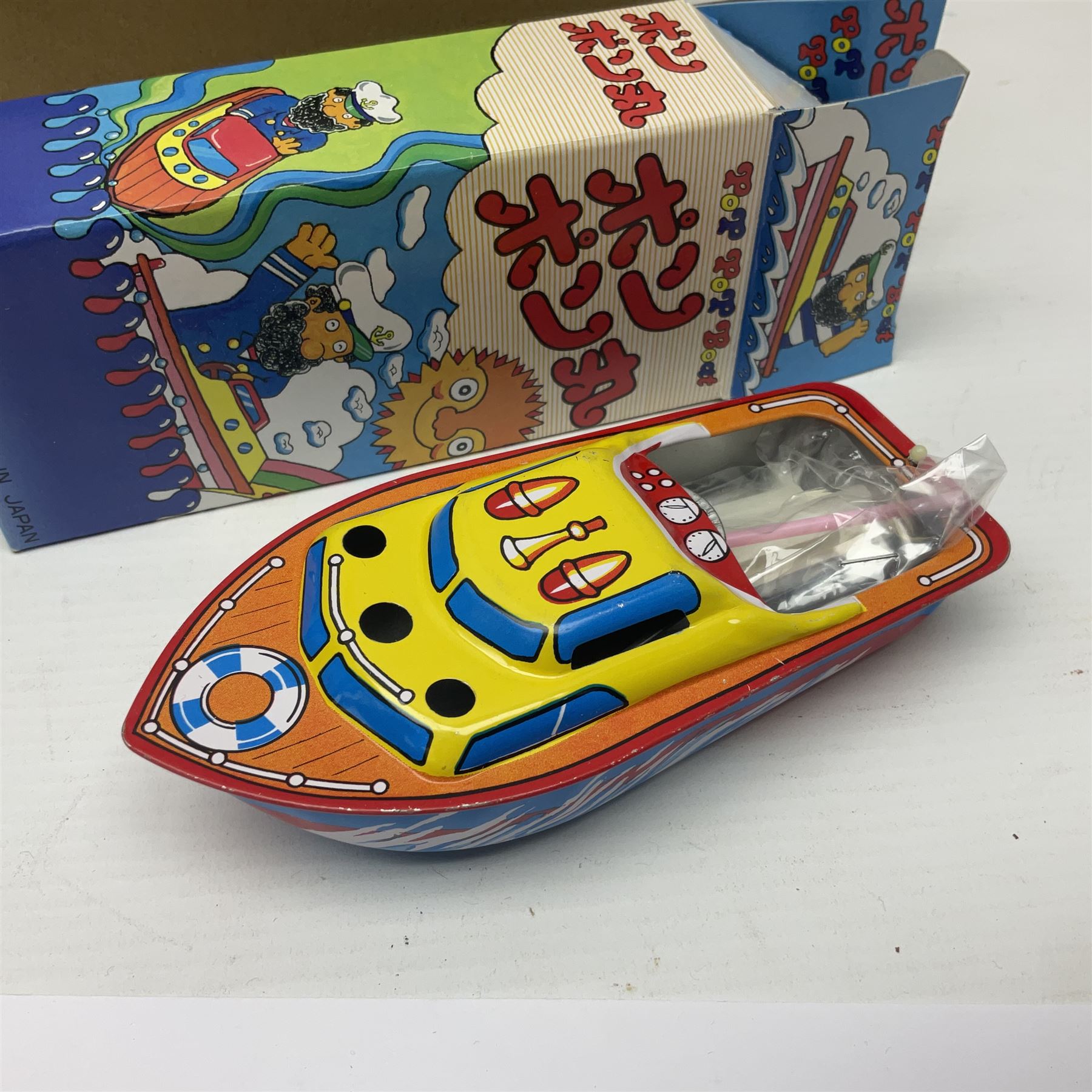 Twenty six tinplate models to include Ferris Wheel and Performing Circus Elephant, marked JW, further similar examples such as Duck on a Bike, Clown on Roller, Carousel; Popeye Tin Speedboat; Looney Tunes Wind Up Cars and Express Train; various international examples, MS107 Jumping Bambi, Pop Pop Boat, jumping frogs, pecking chickens etc; both boxed and loose