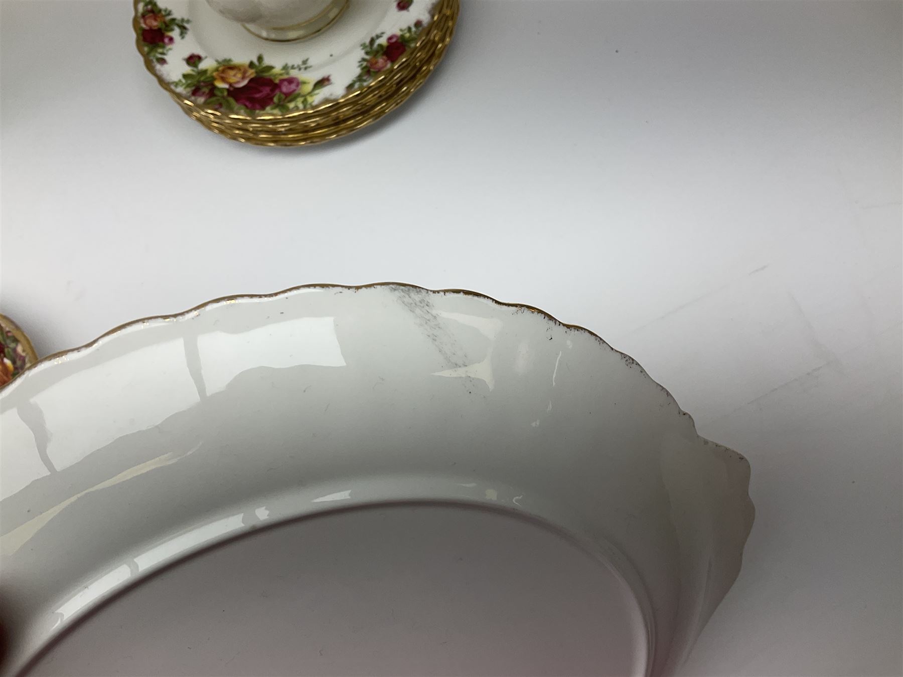 Royal Albert Old Country Roses pattern tea set, comprising teapot, coffee pot, six teacups and six saucers, five side plates, further teacup with joined saucer and side plate, open sucrier, milk jug, cake plate, and preserve pot and cover, together with Royal Albert Jubilee Rose pattern sauce boat and stand, and Royal Albert Lavender Rose pattern cake stand. 