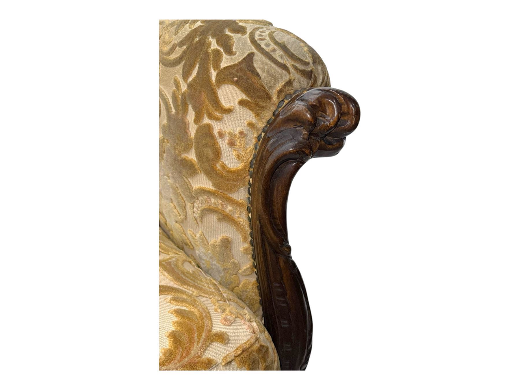 Victorian design stained wood three seater settee, top rail carved and scrolled, padded back and arms, scrolled cabriole feet 