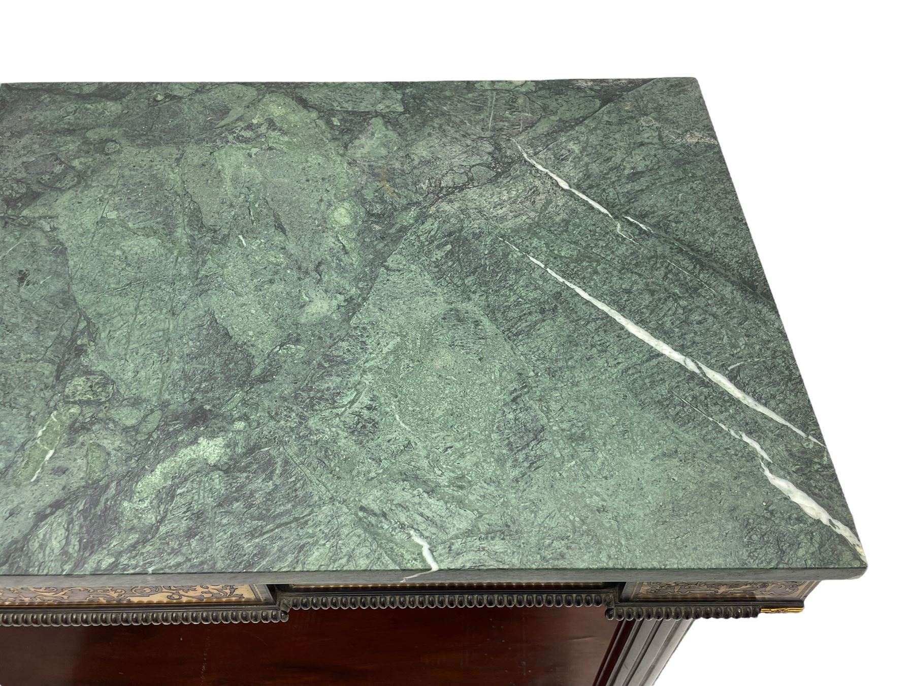 Late 19th century mahogany console or pier table, rectangular green marble top over a break-front frieze inlaid with brass scroll work panels, reed and ribbon gilt metal and wooden beaded applied mouldings, on turned and fluted front supports, plain mirror back over plinth platform base