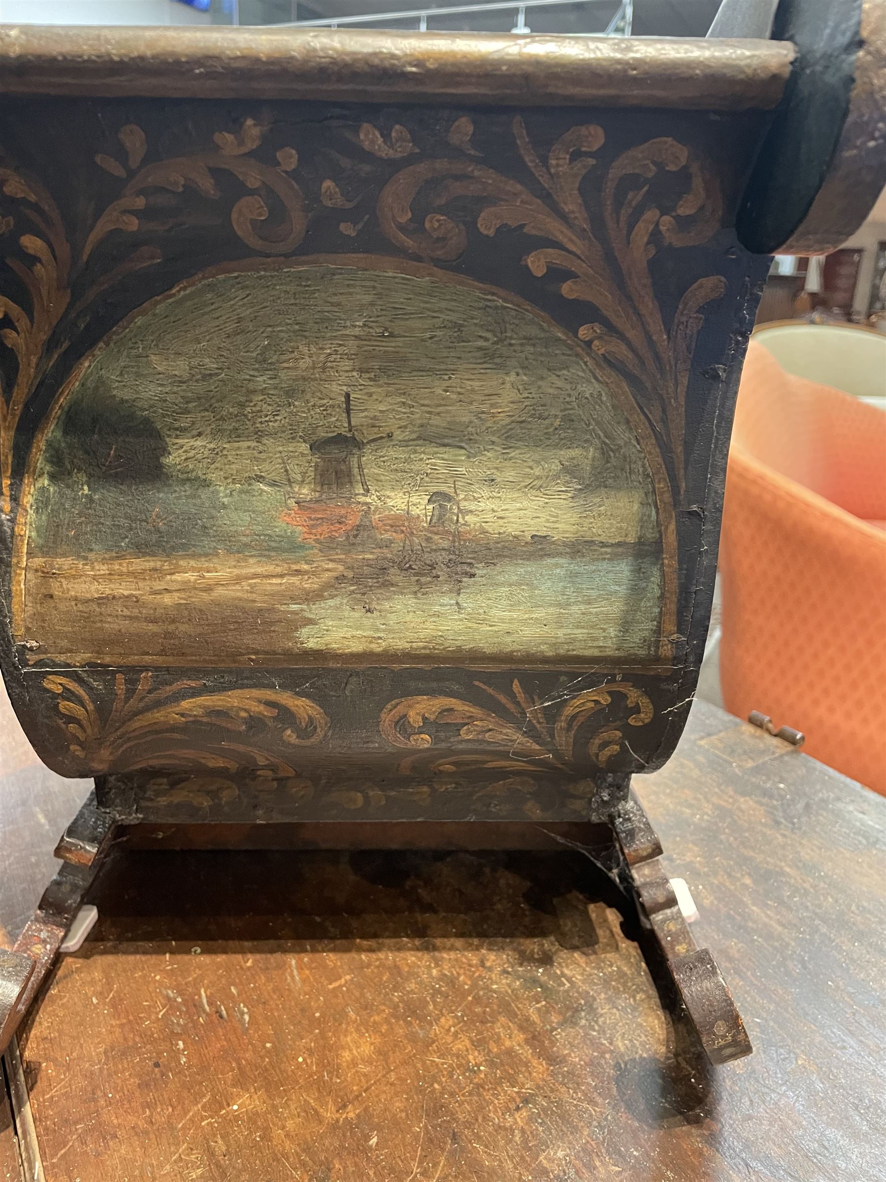 Unusual 18th century small Northern European wooden sled, with curved scroll back, the sides painted with coastal shipping scenes, the interior with removable zinc liner, upon curved irons painted with flower heads, H36cm W56cm D29cm
