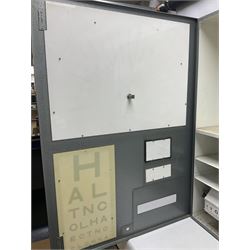 Mid 20th century optician's illuminated eye test chart, cased in grey metal box with separate control switch box, H83cm W60cm D19cm