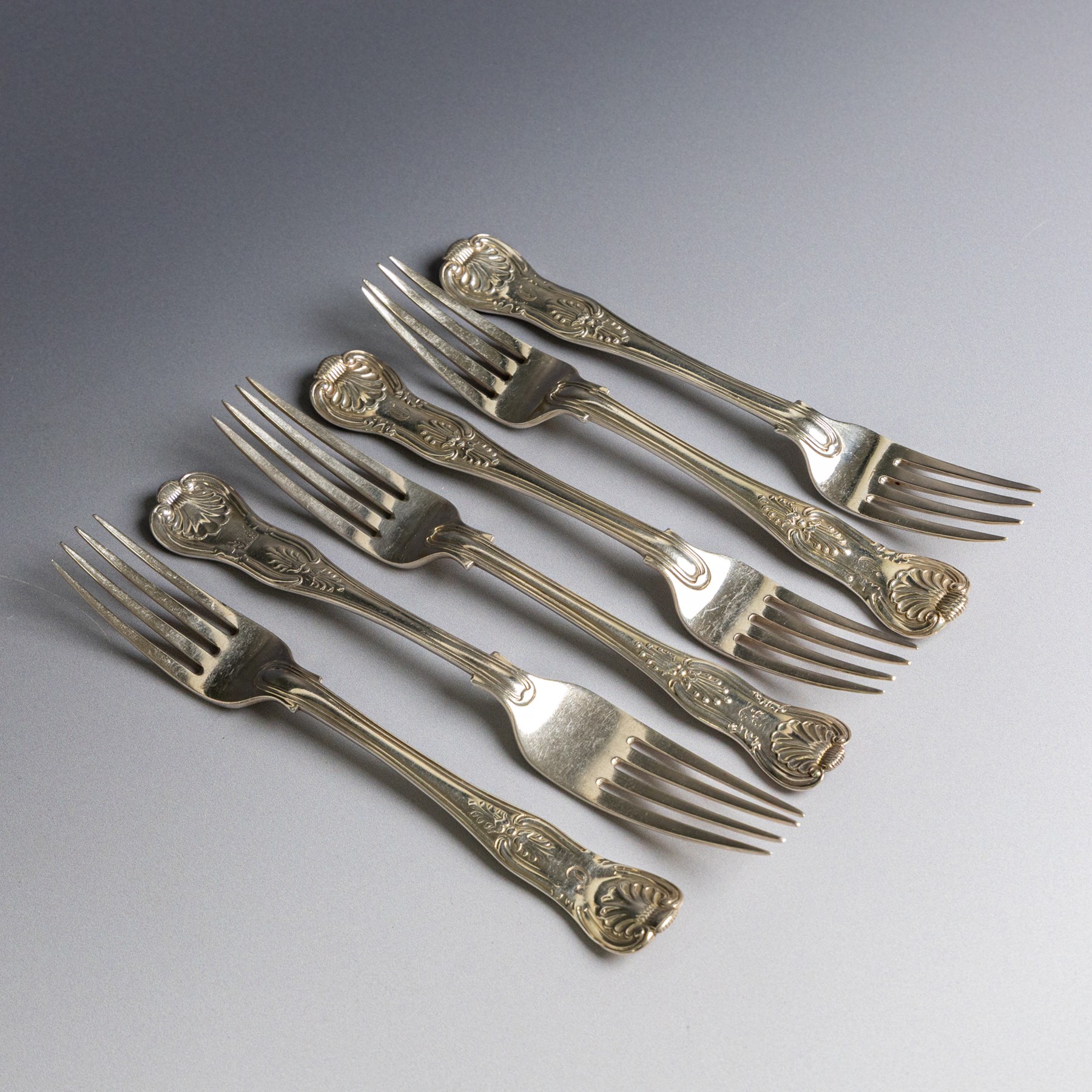 Set of six silver Kings pattern dessert forks, of varying date and maker, all hallmarked 