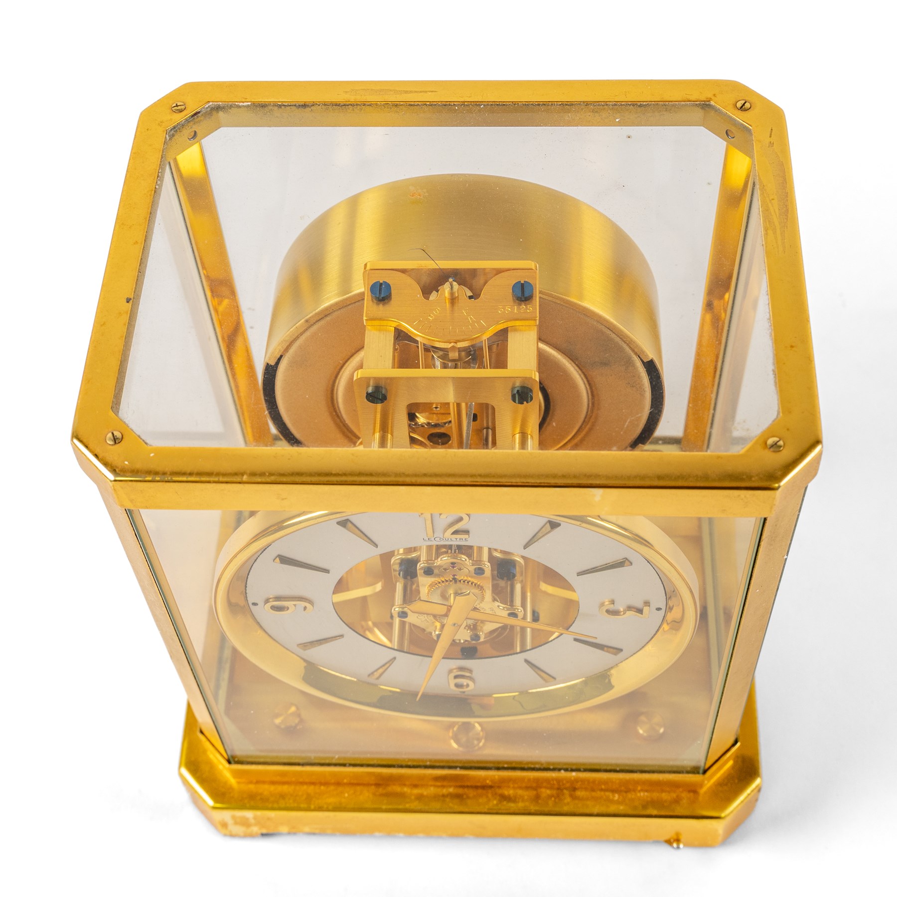Jaeger-Le-Coultre, Atmos bracket clock, gilt brass case with glazed top and sides, silvered chapter ring with the numerals interspaced with batons, serial number 35125, H24cm