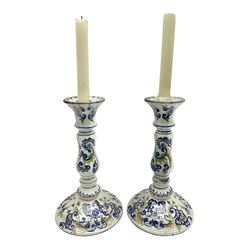 Pair of 19th century French faience candlesticks, H23cm