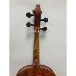 German 1977 C A Gotz Jr full size viola, back neck and sides in maple with a spruce top, ebony fittings and fingerboard with two bows in a hard case Length 69cm