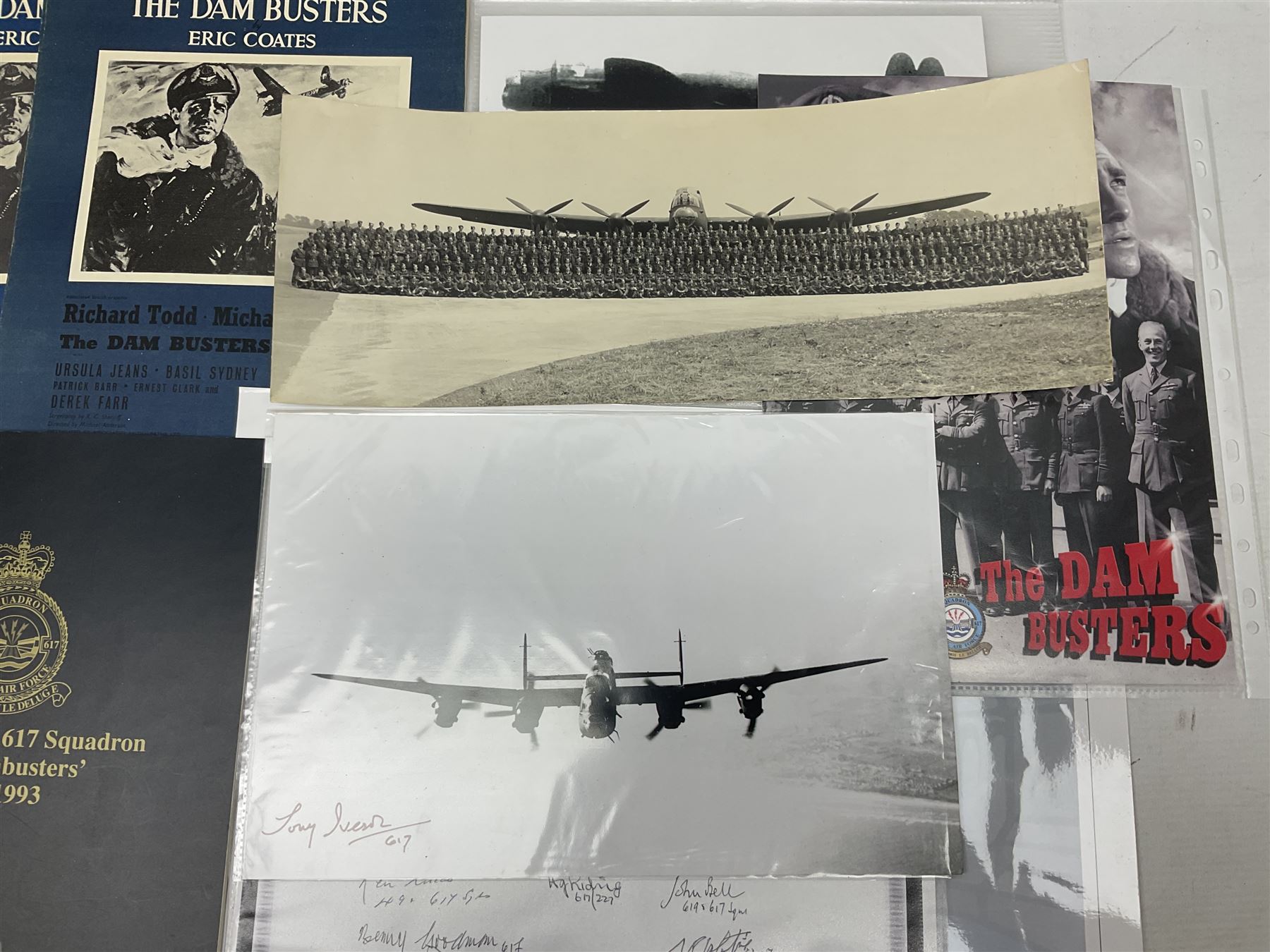 Dambusters 617 Squadron memorabilia - three signed photographs of Lancaster aircraft in flight, group photograph, copy of Vickers-Armstongs letter and drawing from Barnes Wallis, The History of 617 Squadron by Sqn. Ldr. S.J. Hillier, facsimile sets of signatures, FDCs, sheet music, Richard Todd signed photograph and greeting card, etc