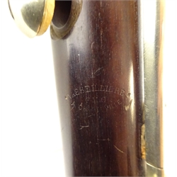  Late 19th Century hardwood clarinet with nickel mounts by Hubert Eugene Vasseilliere, marked Vasseilliere Fils a Charleville, L68cm  