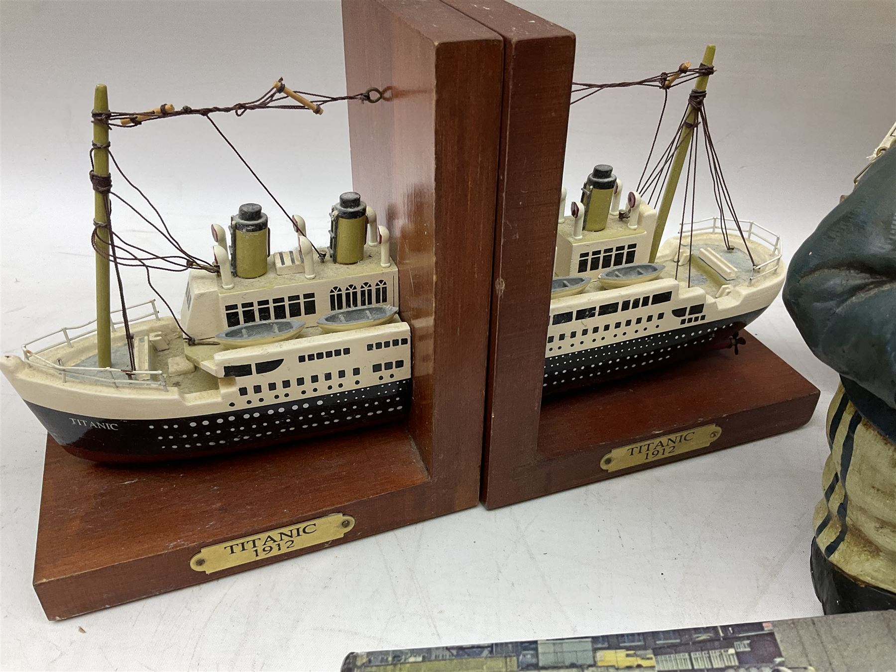 Nautical themed decorative items, to include Titanic book ends, model boat, books, lighthouse lamp etc in one box