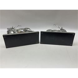 Pair of Composite silvered stags, on rectangular bases, H38cm