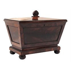  Regency mahogany sacophacus shaped cellarette, hinged top with lotus carved finial and fitted interior, figured panels with lobed borders, on plinth base with bun feet, W76cm, D47cm, H63cm  