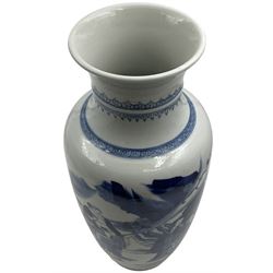 A Chinese blue and white Qing dynasty style vase, painted in underglaze blue with figures in a rocky landscape, six character Kangxi type mark to base, H34cm