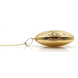 Gold locket pendant, engraved decoration on gold chain, both 9ct hallmarked or stamped, approx 5.3gm
