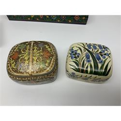 Ten lacquered boxes including oval and rectangular examples, with floral and foliate decoration, largest L20cm, D6cm