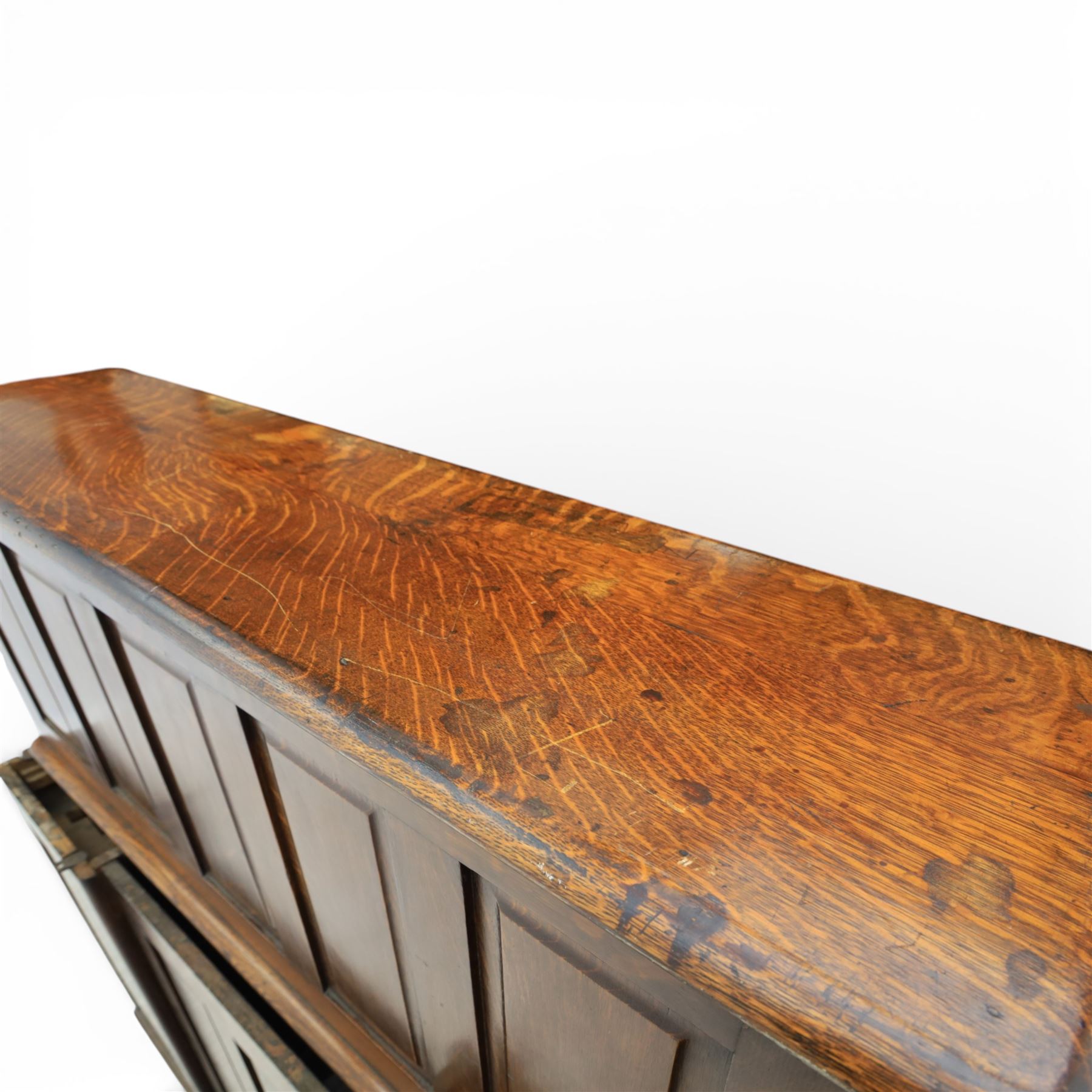 Globe Wernicke - Oak roll top desk, tambour roll top enclosing a fitted interior, raised on two pedestal bases with fitted drawers, raised on a plinth base 