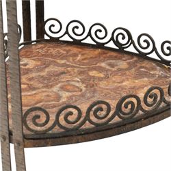 Art Nouveau wrought metal and specimen marble two-tier occasional table, the triangular marble top raised on strap metal uprights with scroll capitals, the under-tier with raised Vitruvian scroll design gallery