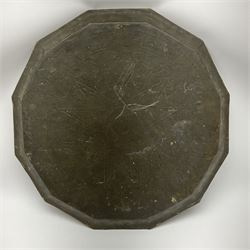 Eastern brass faceted tray with impressed script and scrolling decoration D48cm. 
