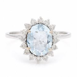 18ct white gold aquamarine and diamond cluster ring, single oval cut aquamarine of approx ...