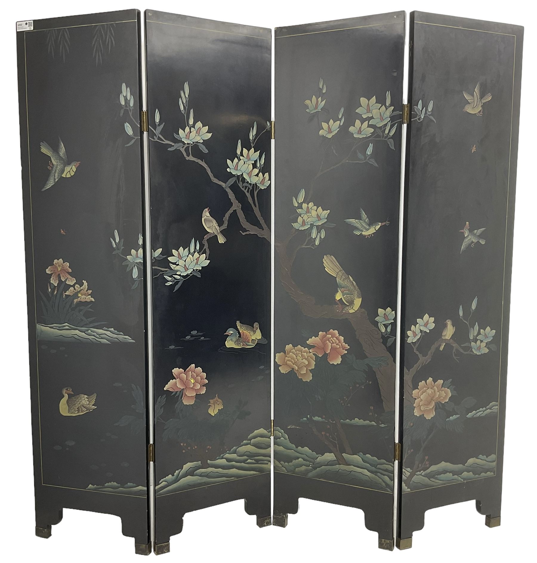 Chinese four-panel folding room screen, black lacquered with a naturalistic scene decorated with trees, birds and flowers