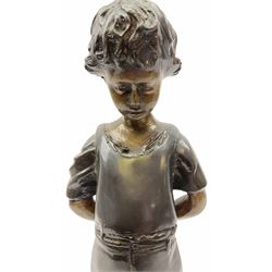 Bronze figure of a young boy standing pensively looking at a frog on a rock by his feet H39cm
