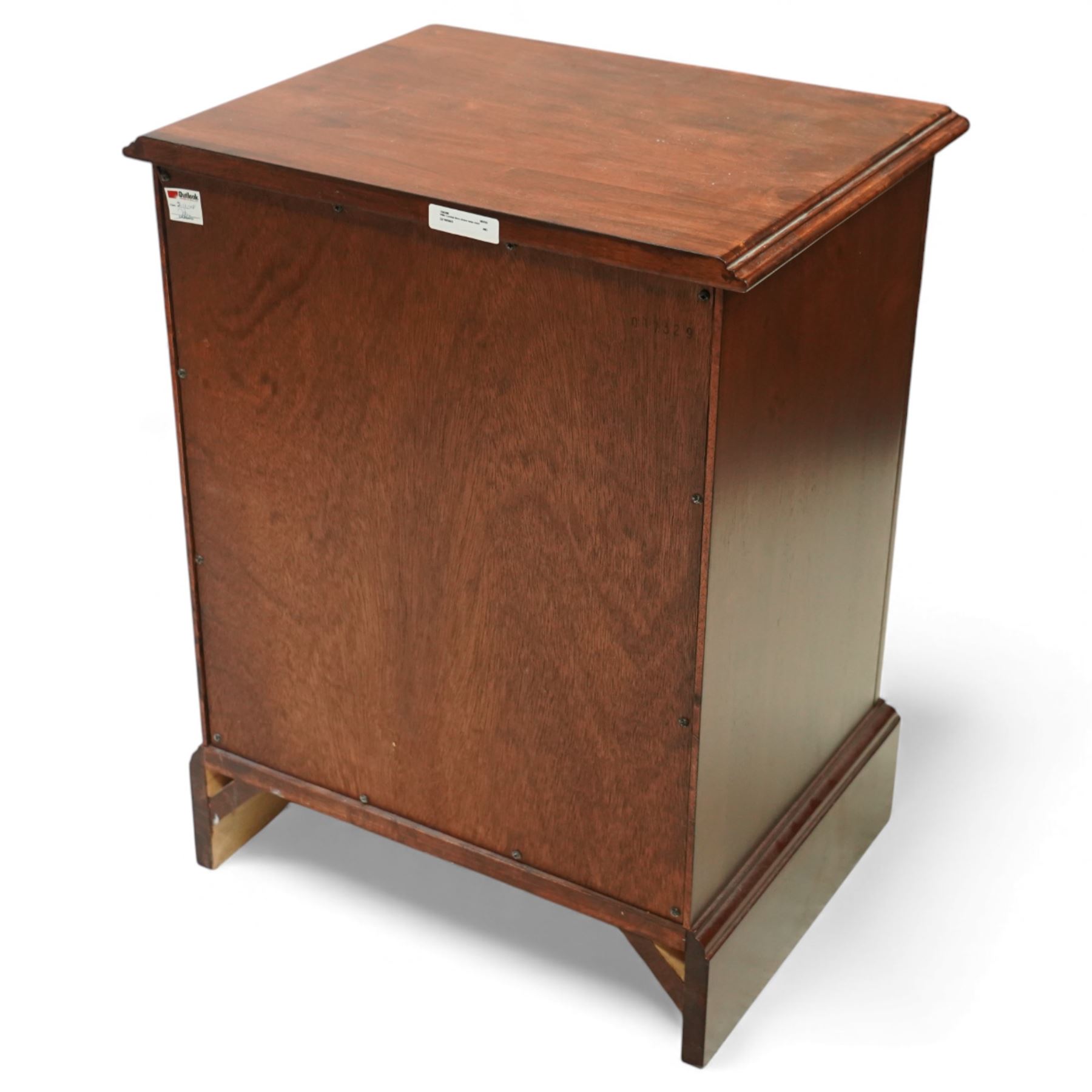 Willis & Gambier - three-drawer lamp chest, rectangular moulded top over three framed drawers with turned wooden knobs, raised on a shaped plinth base