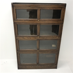 Mid 20th century oak sectional stacking library bookcase, four glazed compartments, platform base, W89cm, H139cm, D26cm