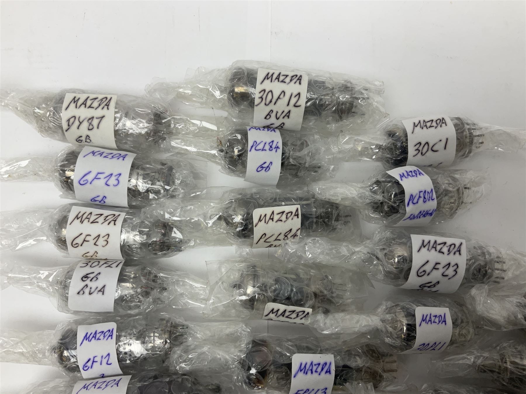 Collection of Mazda thermionic radio valves/vacuum tubes, including EH90, U26, PCF84, U26 approximately 55