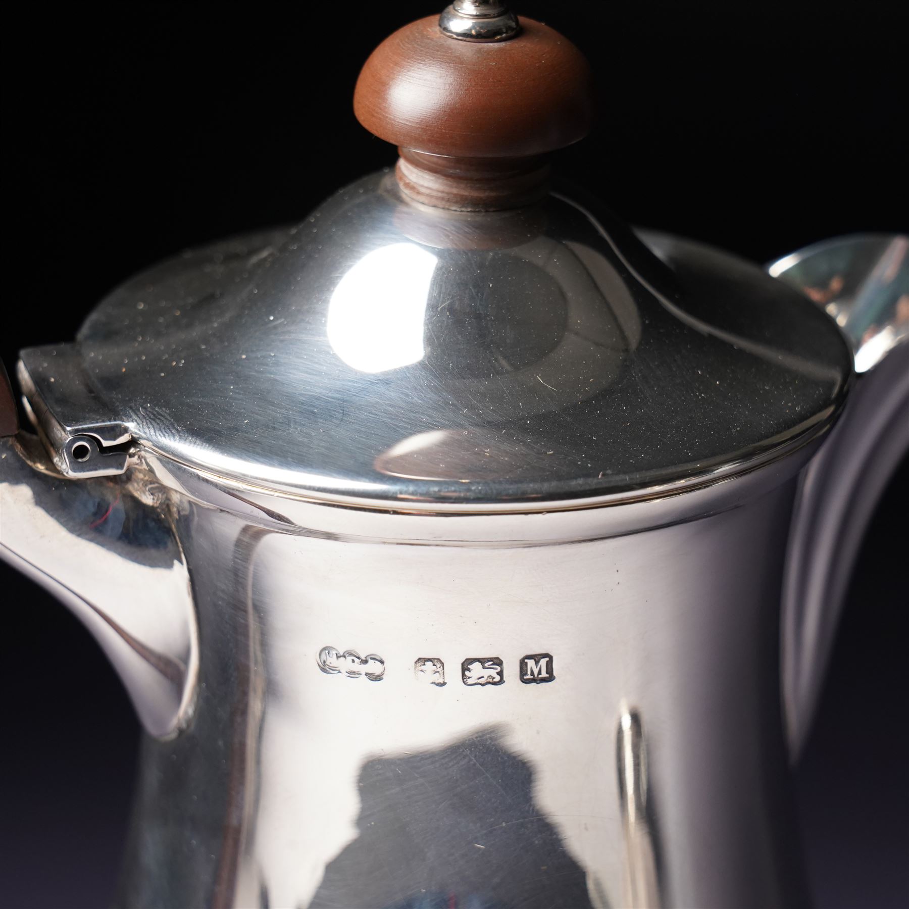Silver three piece tea set of panelled circular form Birmingham 1929 Maker Synyer & Beddoes and a similar hot water jug Sheffield 1954 